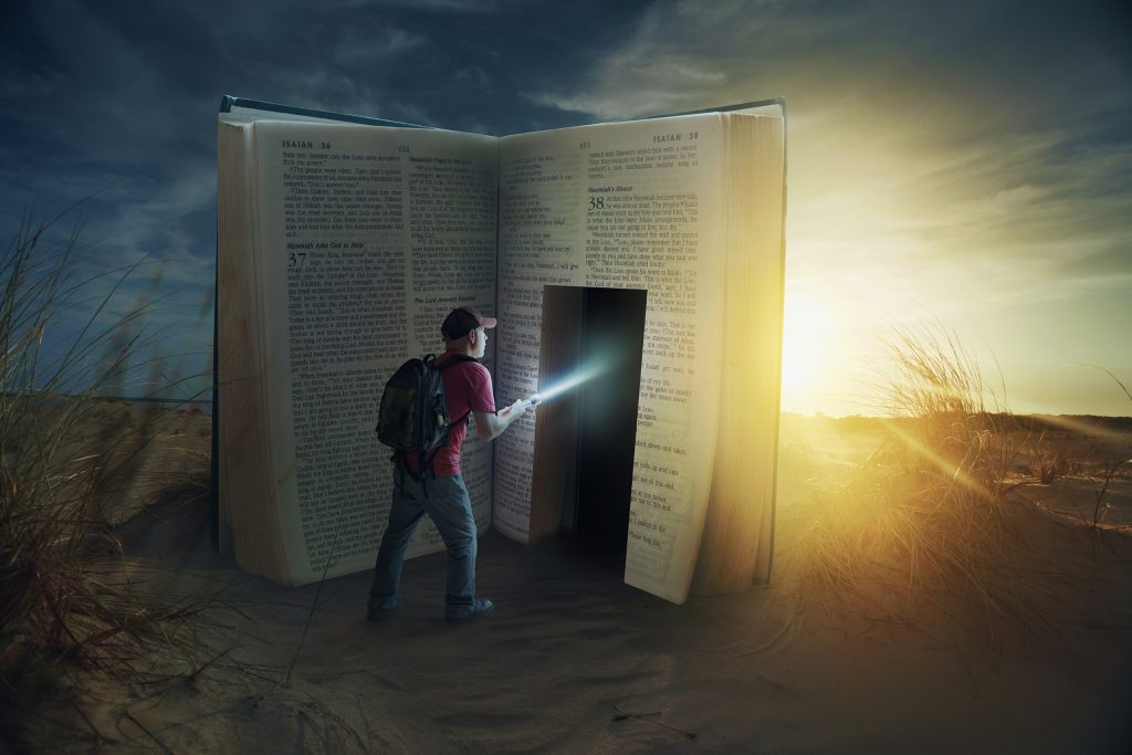 A man discovers a door in an open Bible reflecting the resurrection of Jesus.